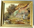 Thatched Cottage Framed Print