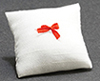 Dollhouse miniature PILLOW, WHITE WITH RED BOW
